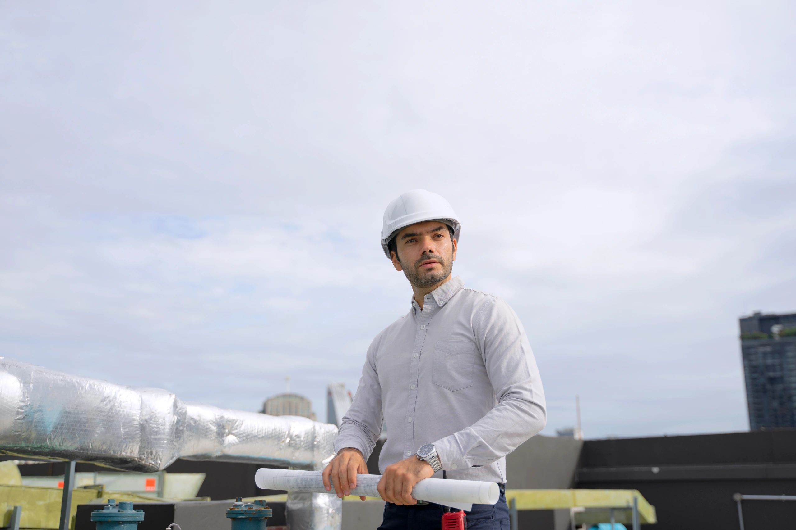 Professional working on commercial air conditioning installation
