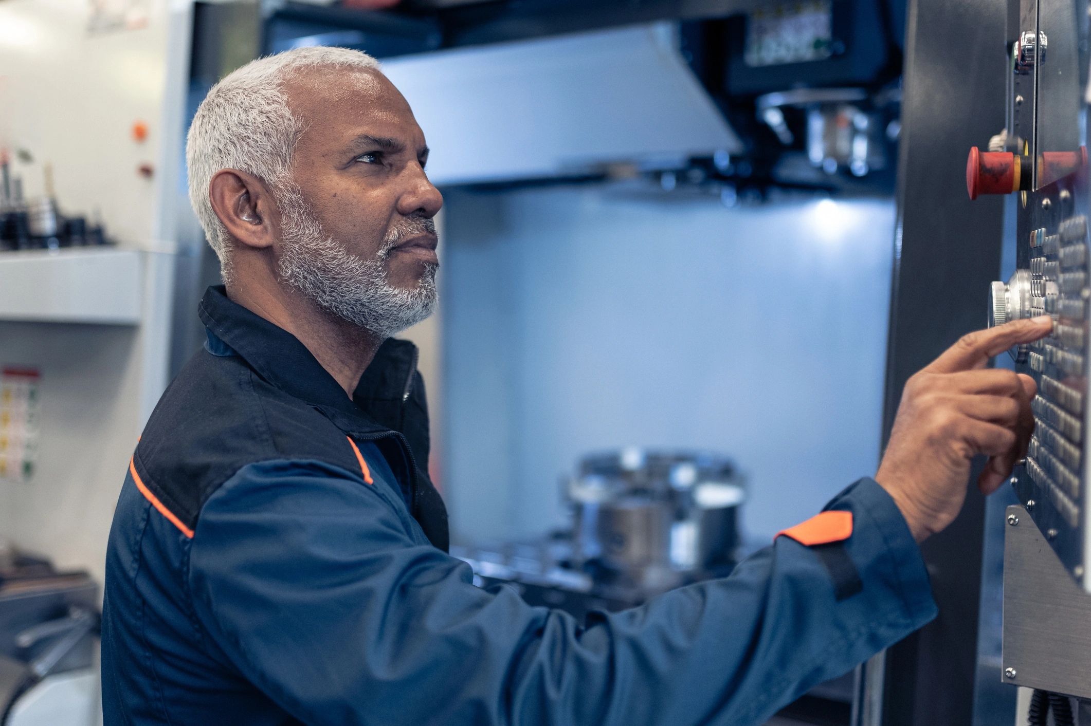 Technician inspecting industrial equipment